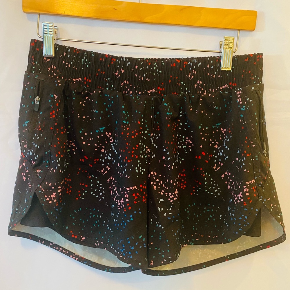 Avia woman’s multi colored activewear lined nylon shorts in a size small.